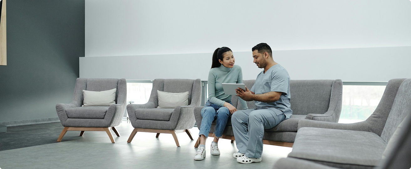 clinician talking to a patient in a calm office